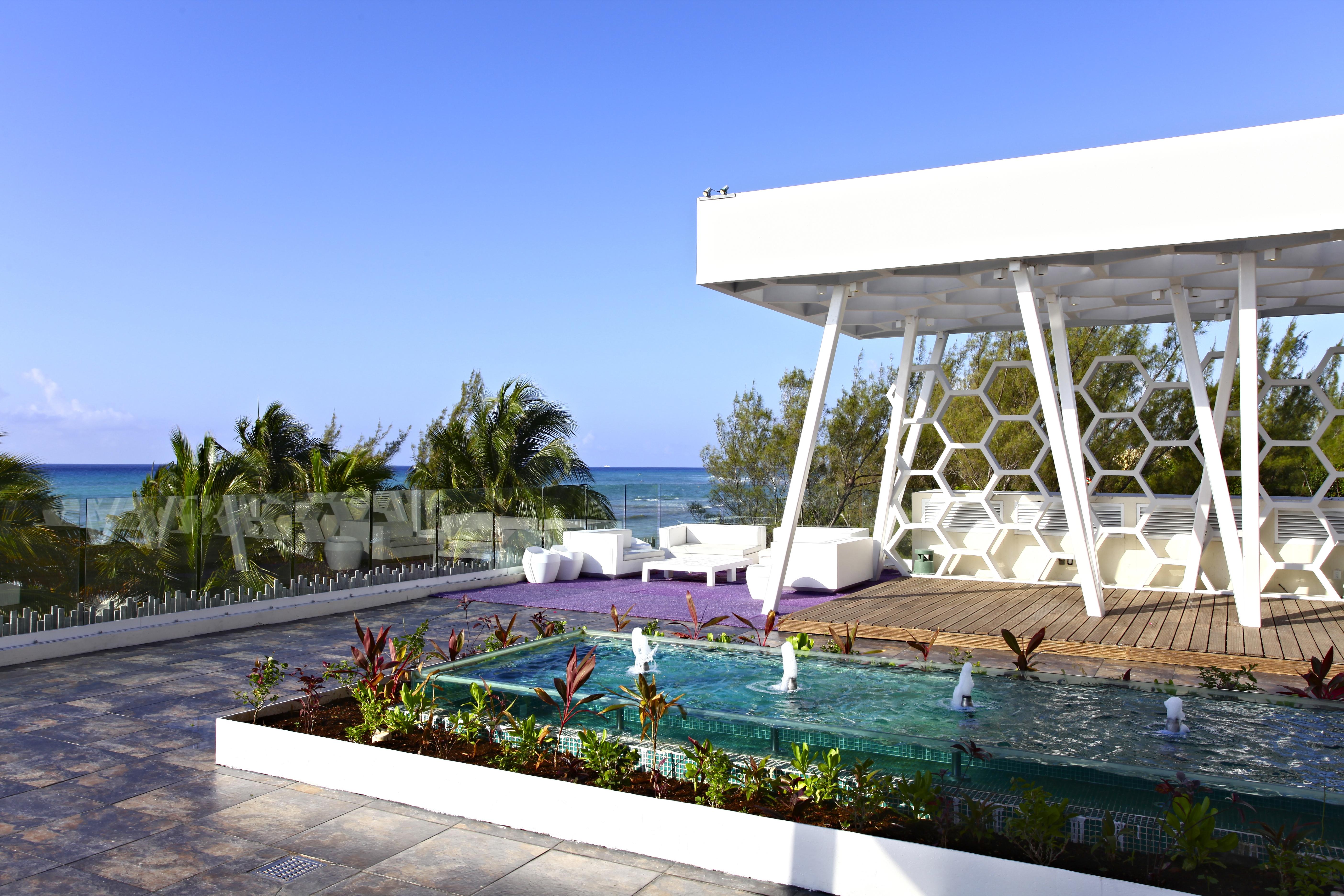 Sandos Caracol Eco Resort All Inclusive (Adults Only) Playa del Carmen Esterno foto Rooftop pool at the Grand Palladium Hotel, Cancun, Mexico