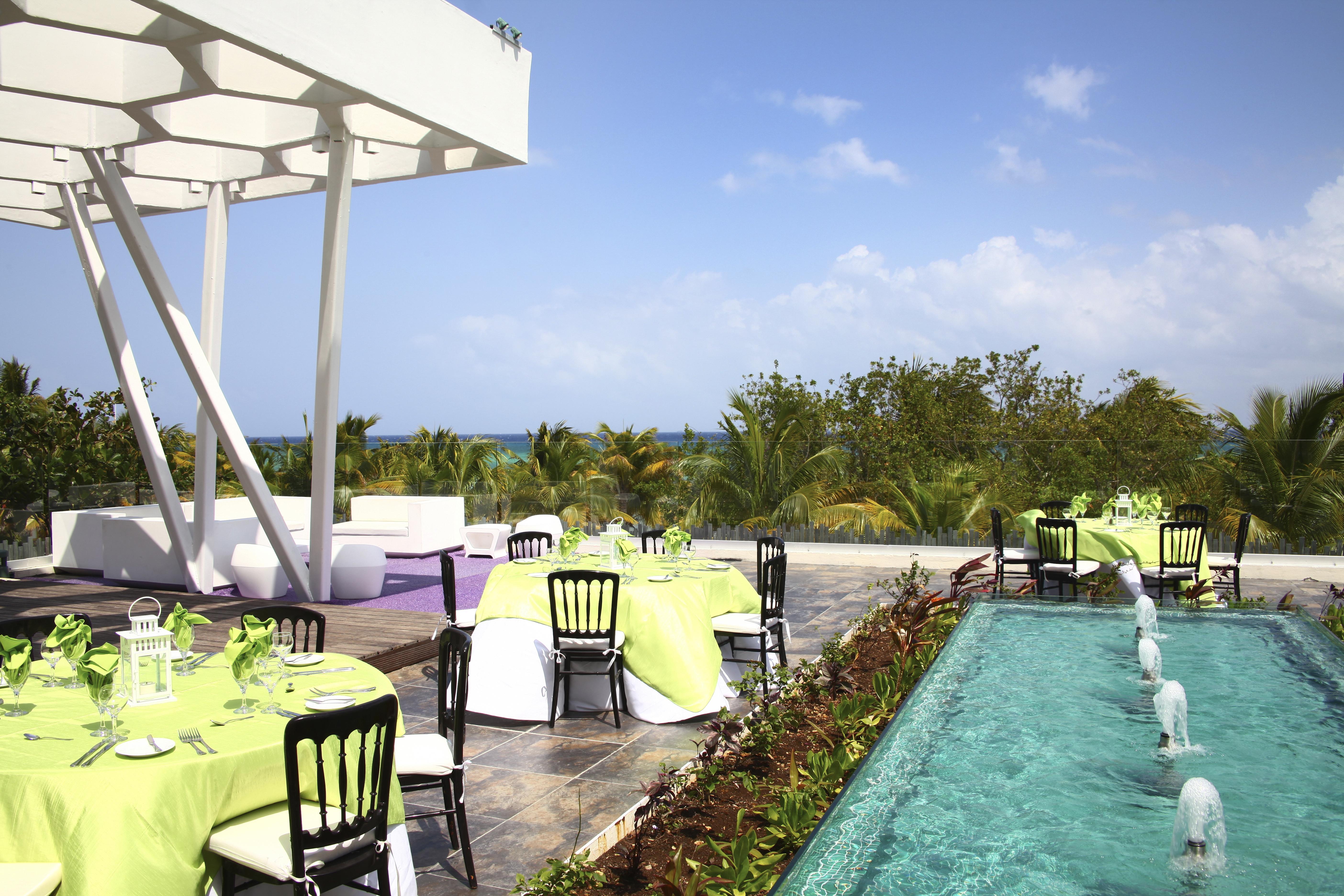 Sandos Caracol Eco Resort All Inclusive (Adults Only) Playa del Carmen Esterno foto The rooftop pool at the hotel