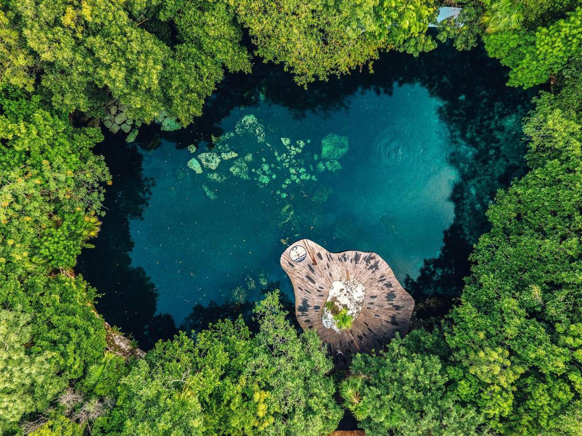 Sandos Caracol Eco Resort All Inclusive (Adults Only) Playa del Carmen Esterno foto Aerial view of the Blue Hole